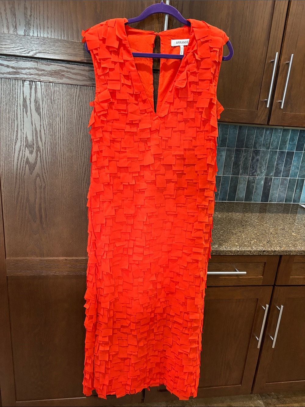 ARRANGE, from ASOS, v-neck, sleeveless Maxi Dress with pockets in red/orange.